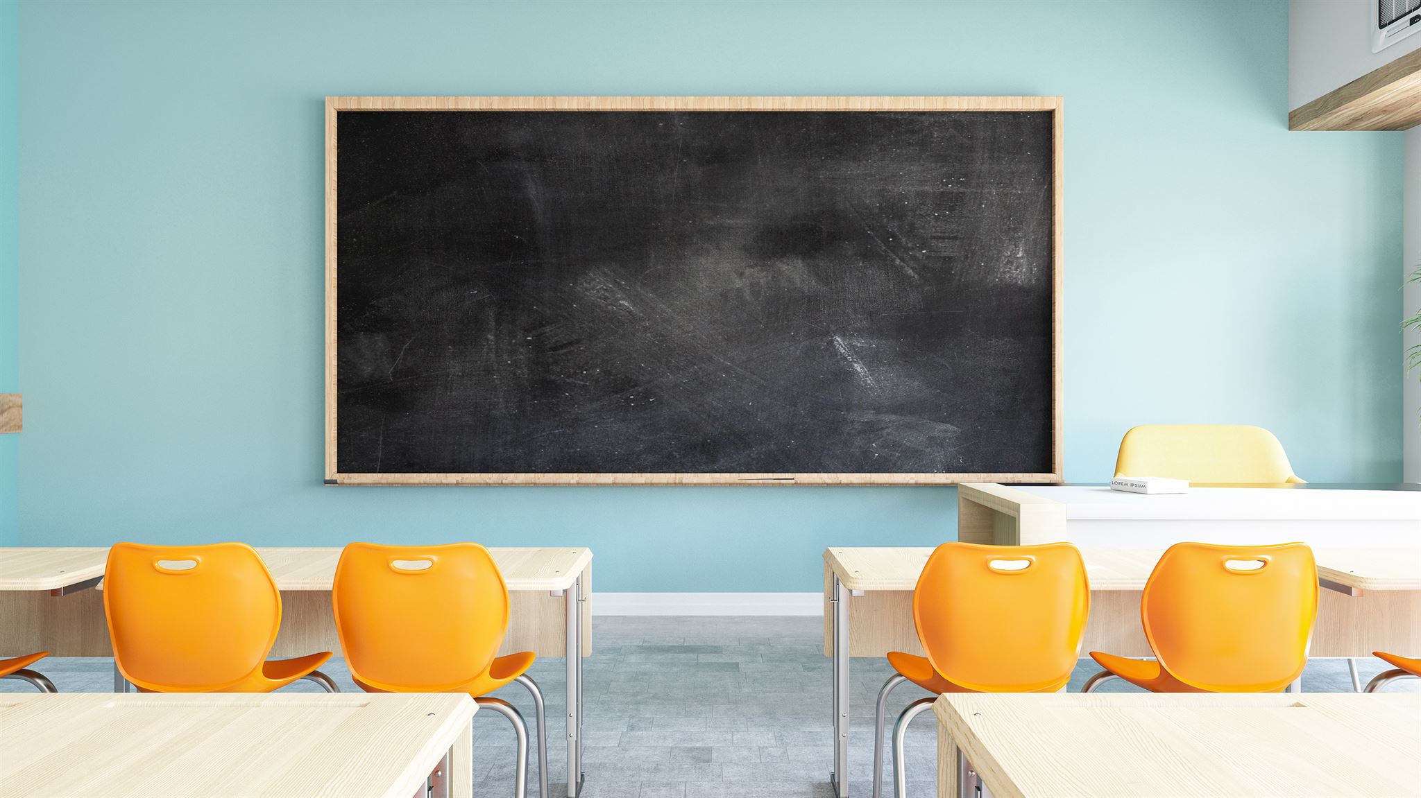 Blackboard-and-yellow-chairs-in-a-classroom